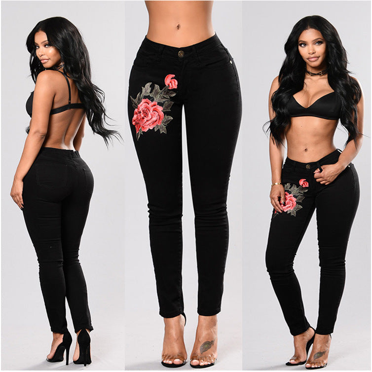 Perforated embroidered high elastic jeans